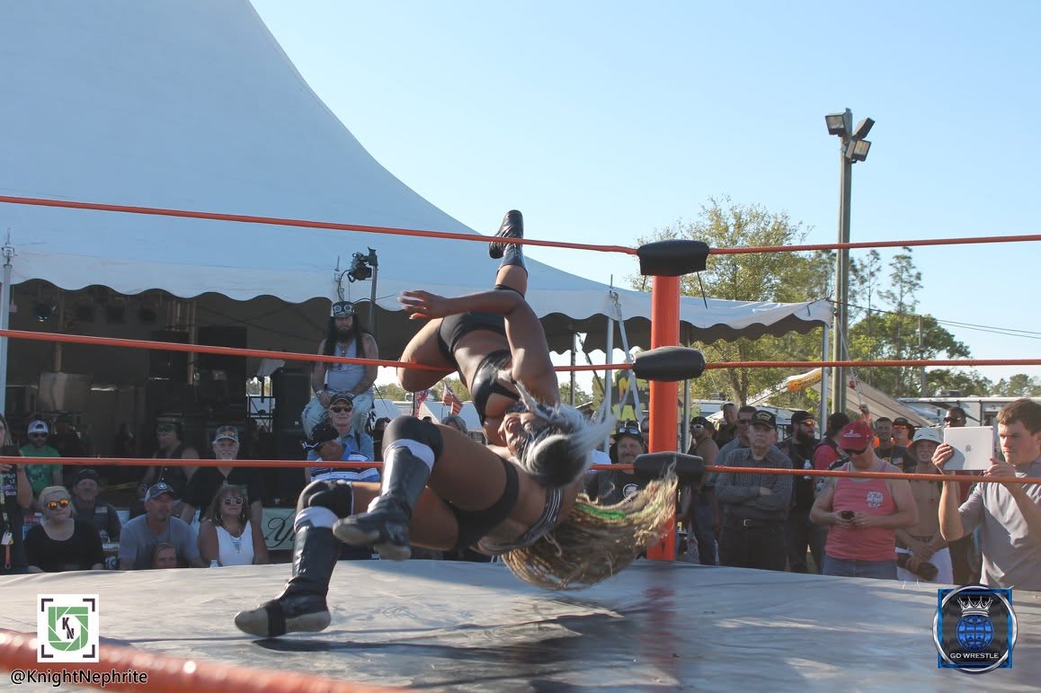 Lacey picks up the win on the corkscrew neckbreaker! — with Lacey Lane at Cacklebery Campground.