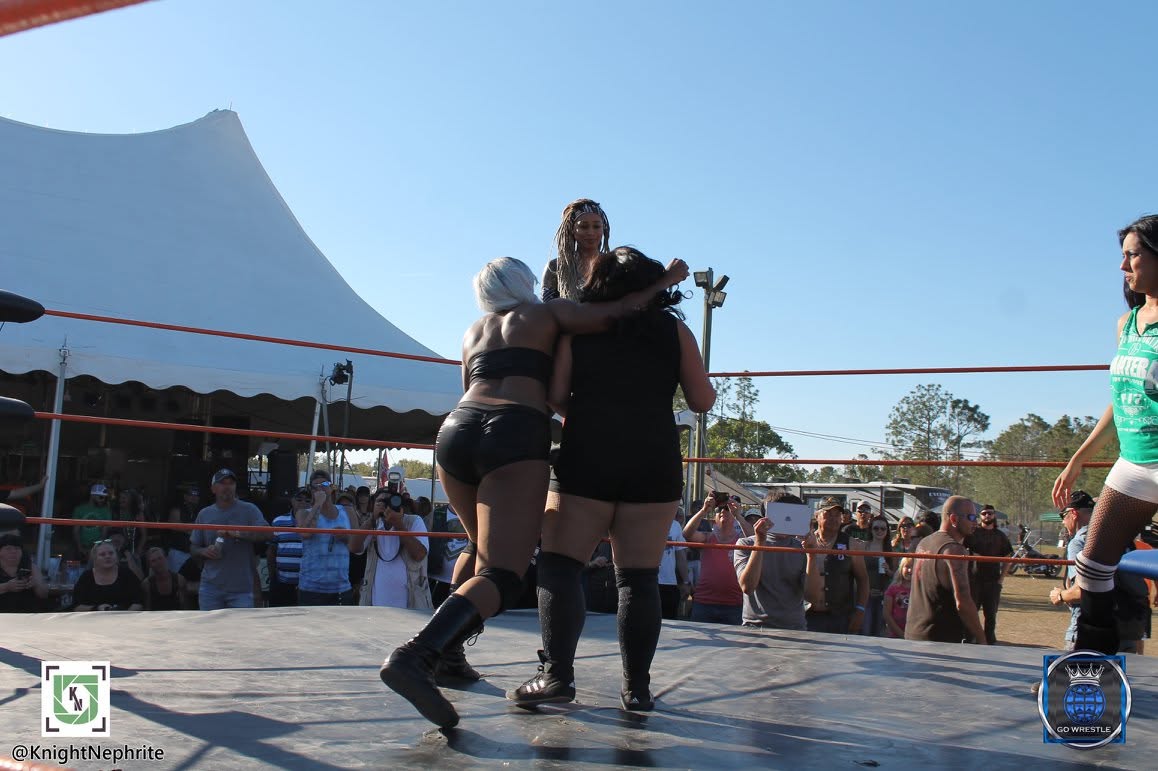 Triple Threat Match - Lacey Lane vs. Black Diamond vs. Lexii Gomez (who was eliminated off this clothlesline from behind) — with Lexii Gomez and Lacey Lane at Cacklebery Campground. 1