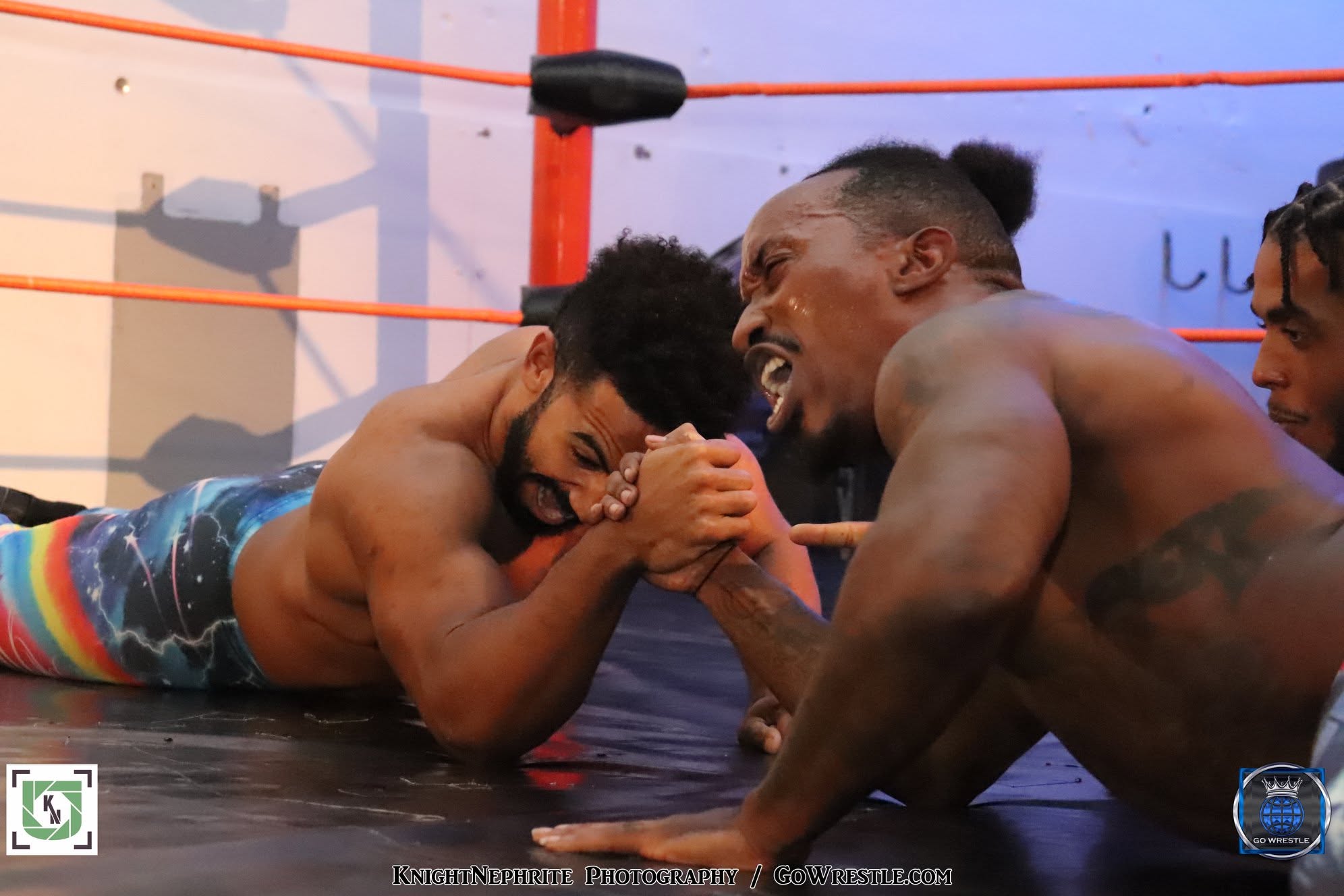 The match breakdown into an armwrestling match!